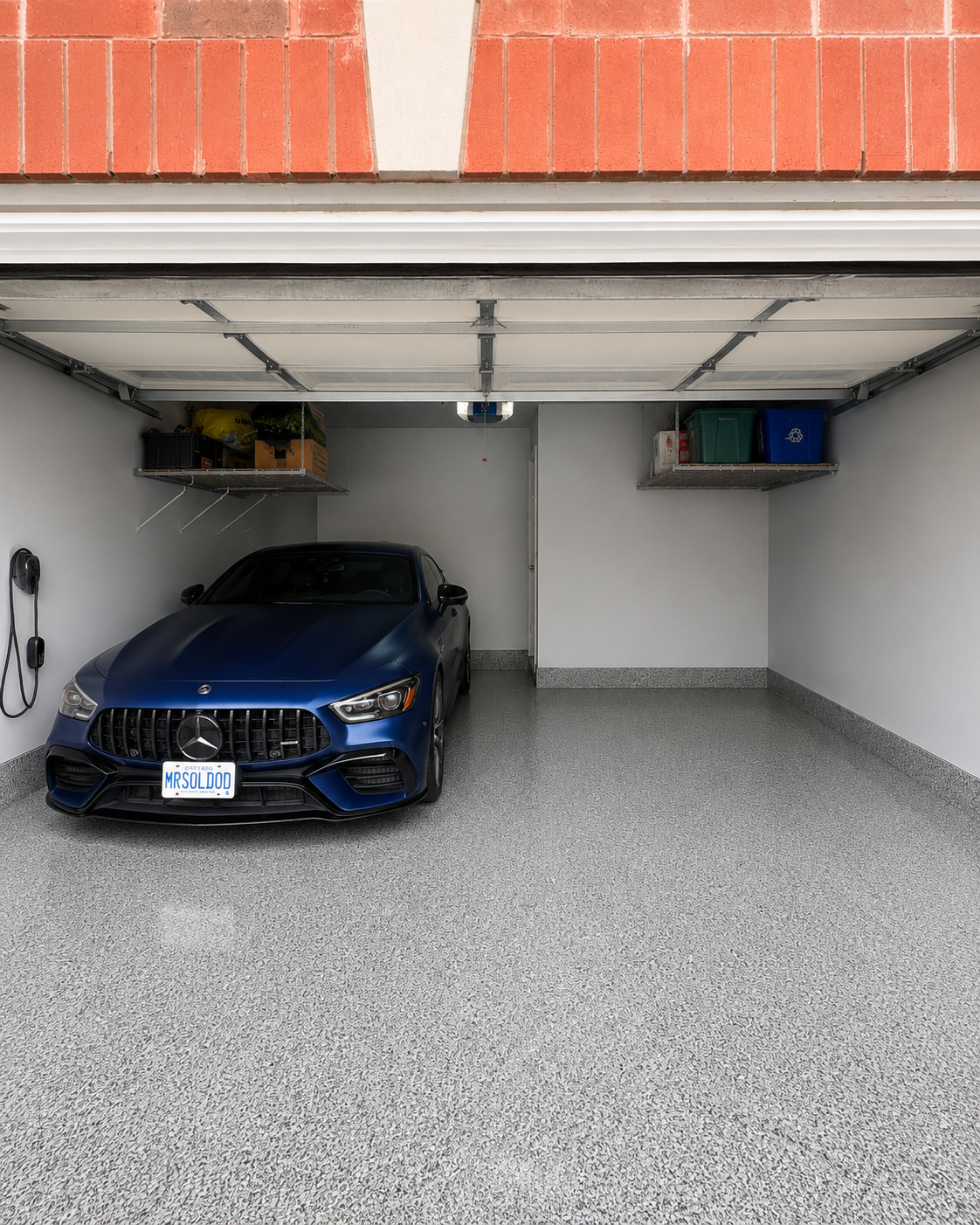 Grey flake epoxy garage floor with Mercedes