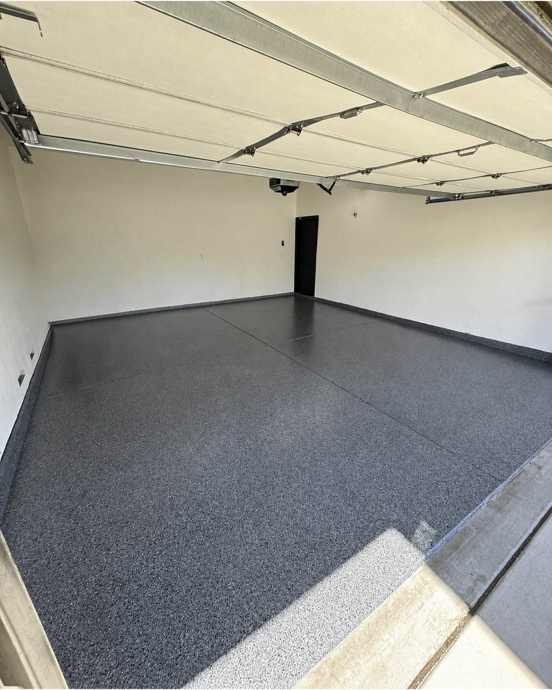Premium dark metallic epoxy garage